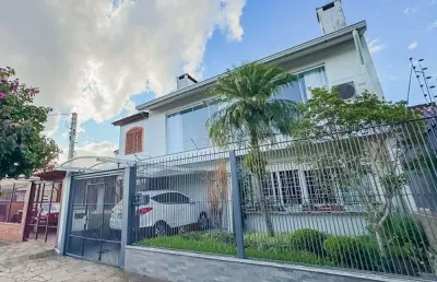 Casa com 4 quartos à venda na Rua Pedro Waine, 268, Santa Maria Goretti, Porto Alegre