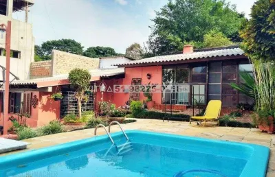 Casa com 6 quartos à venda na Avenida Arnaldo Bohrer, 259, Teresópolis, Porto Alegre