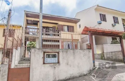 Casa com 4 quartos à venda na Rua Santiago Dantas, 508, Cascata, Porto Alegre