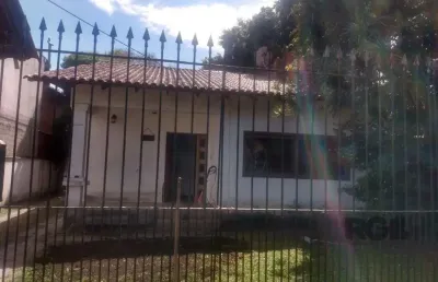 Casa com 3 quartos à venda na Rua Mura, 173, Guarujá, Porto Alegre