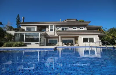 Casa no jardim do sol-vista panorâmica,4 suítes, 900m²privativos, terreno 1800m²