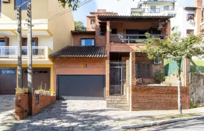 Casa com 5 quartos à venda na Rua Fernando Osório, 649, Teresópolis, Porto Alegre