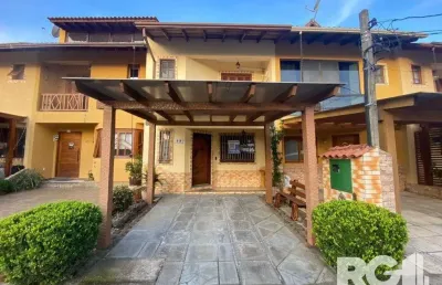 Casa com 3 quartos à venda na Avenida Edgar Pires de Castro, 1286, Hípica, Porto Alegre