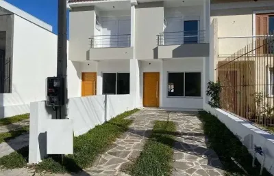 Casa com 3 quartos à venda na Rua Itacyr Rossi, 195, Guarujá, Porto Alegre
