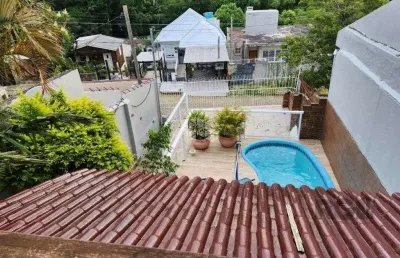 Casa com 3 quartos à venda na Rua Silvério Souto, 540, Teresópolis, Porto Alegre