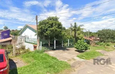 Casa com 3 quartos à venda na Rua Ênio de Souza, 226, Vila Nova, Porto Alegre