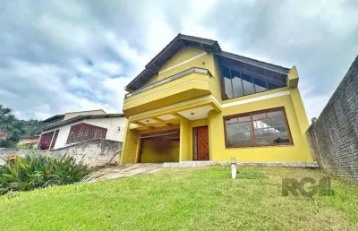 Casa com 3 quartos à venda na Rua Costa Lima, 479, Nonoai, Porto Alegre