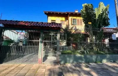 Casa com 3 quartos à venda na Rua Frederico Etzberger, 278, Nonoai, Porto Alegre
