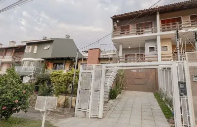 Casa com 3 quartos à venda na Avenida Doutor Francisco Roberto Dall Igna, 308, Espírito Santo, Porto Alegre