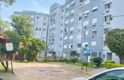 Apartamento dois dormitórios térreo com uma vaga escriturada
