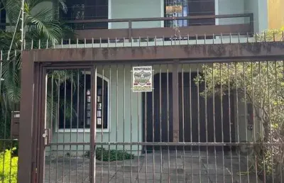 Casa com 5 quartos à venda na Rua Menezes Paredes, 238, Nonoai, Porto Alegre