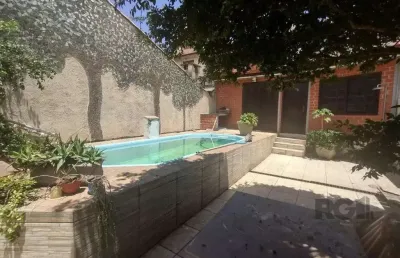Casa com 4 quartos à venda na Rua Laguna, 181, Cavalhada, Porto Alegre