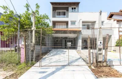Casa com 3 quartos à venda na Rua Ari Peixoto Martins, 146, Espírito Santo, Porto Alegre
