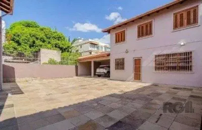 Casa com 4 quartos à venda na Rua Fonseca Ramos, 127, Medianeira, Porto Alegre