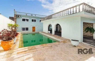 Casa com 4 quartos à venda na Rua Miracema, 134, Chácara das Pedras, Porto Alegre