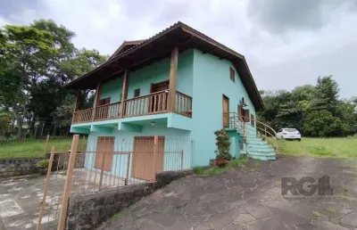 Casa com 3 quartos à venda na Avenida Santo Dias da Silva, 924, Lomba do Pinheiro, Porto Alegre