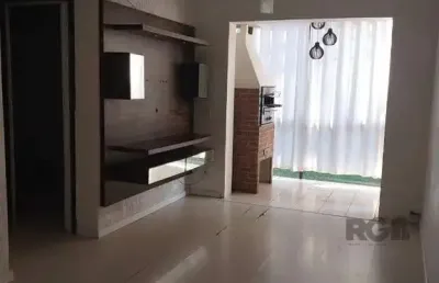 Vende-se apartamento 2 dorm com vaga, sacada com churrasqueira - 64m² - partenon