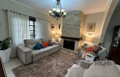 Vende-se ampla casa 3 quartos com hidro, 2 vagas, living com ladeira e salão de festas com churrasqueira - 260m² - medianeira