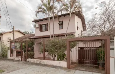 Casa com 4 quartos à venda na Rua Três Passos, 107, Passo da Areia, Porto Alegre