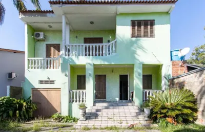 Casa com 3 quartos à venda na Avenida da Serraria, 820, Espírito Santo, Porto Alegre