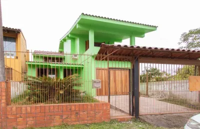 Casa com 3 quartos à venda na Rua Augusto de Lourenço Martins, 110, Vila Nova, Porto Alegre