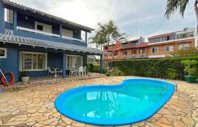 Casa de esquina com 285m², 3 dormitórios, sendo 1 suites, 4 vagas - amplo pátio com piscina,  residencial bahamas