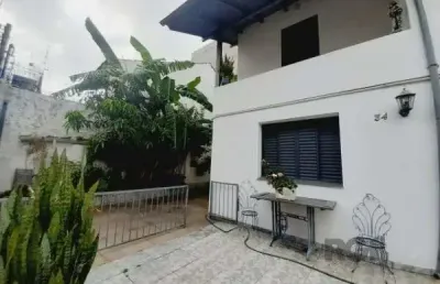 Casa com 4 quartos à venda na Rua Barão de Cerro Largo, 34, Menino Deus, Porto Alegre