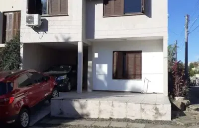 Casa quatro dormitórios ( 1 suíte) garagem ( 2 carros)