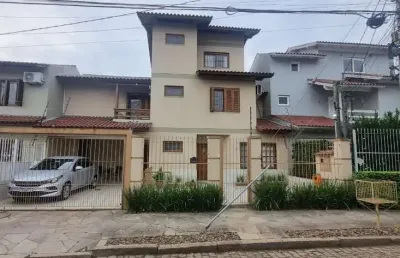 Casa com 3 quartos à venda na Rua Luiz Delfino, 109, Espírito Santo, Porto Alegre