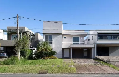 Casa em condomínio fechado com 4 quartos à venda na Avenida Juca Batista, Belém Novo, Porto Alegre