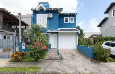 Casa em condomínio fechado com 3 quartos à venda na Rua Pau-Brasil, 437, Hípica, Porto Alegre