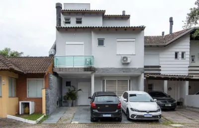 Casa em condomínio fechado com 4 quartos à venda na Estrada João Salomoni, 600, Vila Nova, Porto Alegre