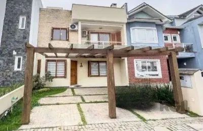 Casa em condomínio fechado com 3 quartos à venda na Rua Carlos Maximiliano Fayet, 80, Hípica, Porto Alegre