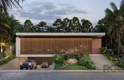 A casa conta com 434m2 de área construída, mas com um aproveitamento total dos 1.012m2 do lote
