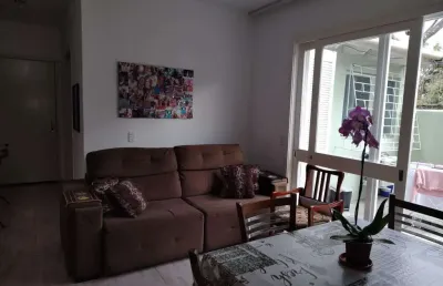 Apartamento garden, 2 dormitórios, 1 suíte,  e 1 vaga de garagem coberta.