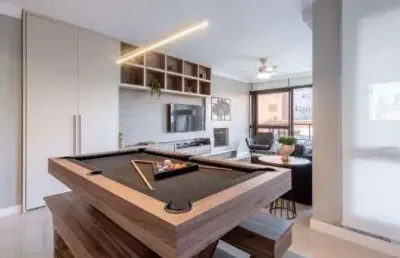 Apartamento garden com 118m², com 2 dormitórios, 2 suítes, lavabo, churrasqueira, lareira e 2 vagas de garagem.
