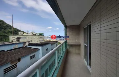 Apartamento com sala ampla e varanda com churrasqueira