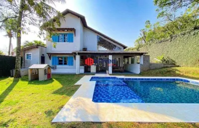 Casa com varanda gourmet e piscina à venda em são vicente/sp