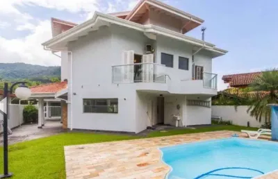 Casa com 4 dormitórios à venda, 350 m² por r$ 6.900.000,00 - tabatinga - caraguatatuba/sp