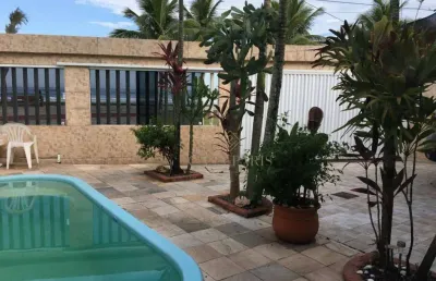 Casa frente mar com piscina e 3 dormitórios a venda na praia grande!