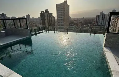 Apartamento com 2 dormitórios à venda, 61 m² por r$ 419.000 - tupi - praia grande/sp