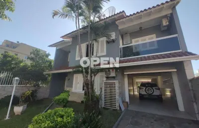 Casa com 4 quartos à venda na Rua Quinze de Novembro, Nossa Senhora das Graças, Canoas