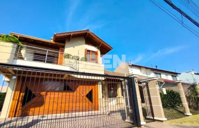 Casa com 4 quartos à venda na Rua das Petúnias, Loteamento Bela Vista, Canoas