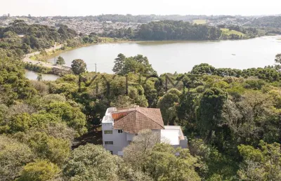 Casa charmosa abraçada pela natureza no parque passaúna - 5 dormitórios - 454 m²