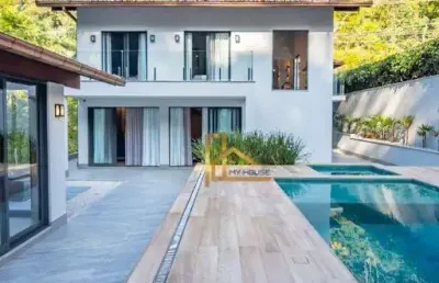 Casa de alto padrão com estilo neorustico à venda no comary na gleba 5