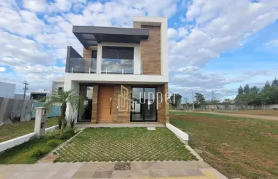 Casa com 3 dormitórios à venda, 132 m² por r$ 890.000,00 - condomínio central square - gravataí/rs