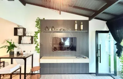 Casa com 4 quartos à venda em itaguá, ubatuba  por r$ 1.195.000