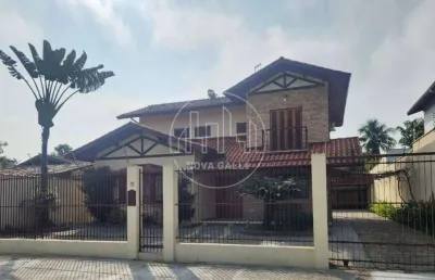 Casa com 4 quartos à venda em itaguá, ubatuba  por r$ 1.900.000
