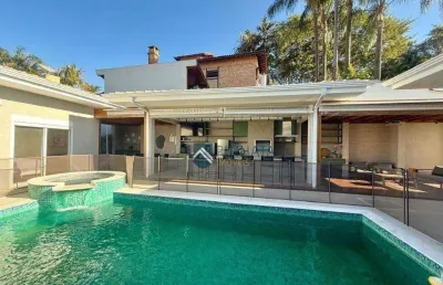 Casa térrea alto padrão com 4 suítes, piscina aquecida e jacuzzi no condomínio marambaia – vinhedo/sp