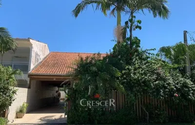 Casa com 4 quartos à venda na Rua Odilon Santana Gomes, 29, Balneário Caravelas, Matinhos